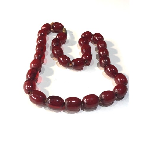 229 - Antique cherry amber / bakelite bead necklace 38 g good internal swirls