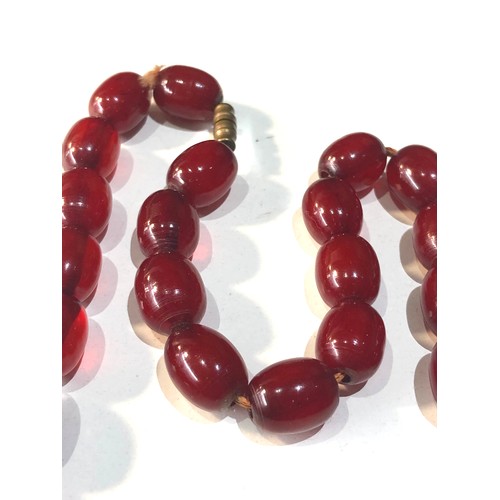 229 - Antique cherry amber / bakelite bead necklace 38 g good internal swirls