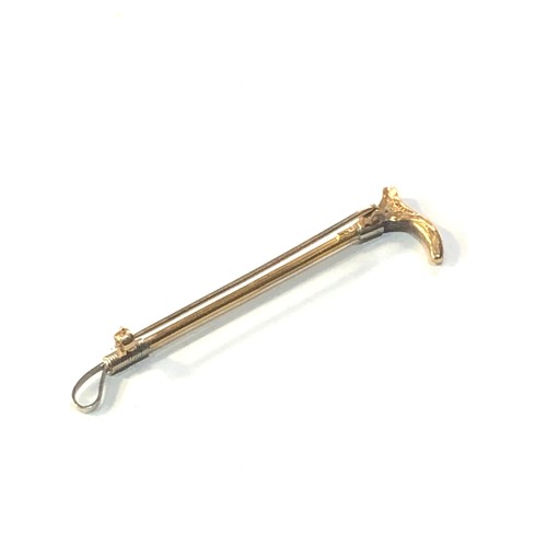 191 - Vintage 9ct gold riding crop pin brooch 3.4g