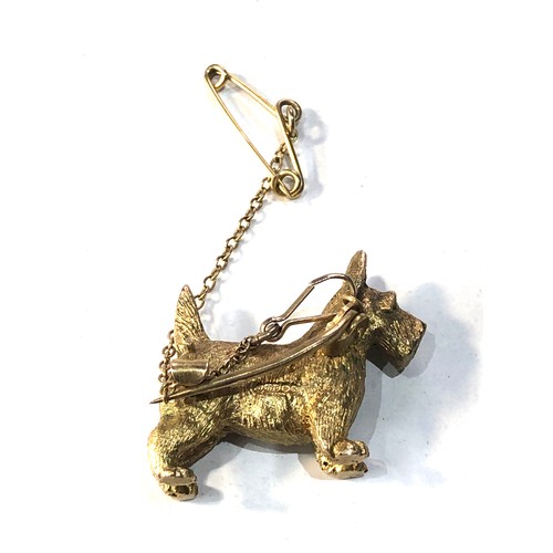 125 - 9ct gold dog brooch 11.5g