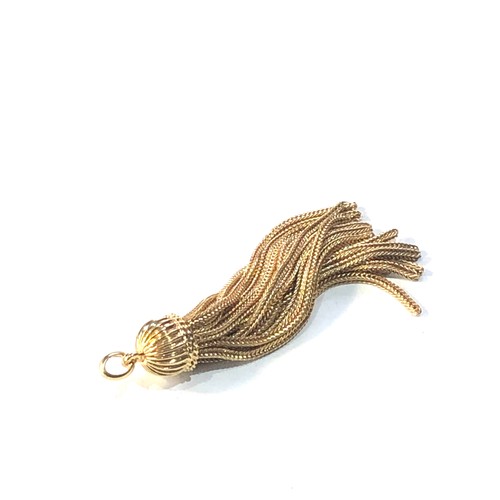 141 - large 18ct gold tassel pendant 15.3g xrt tested as 18ct gold