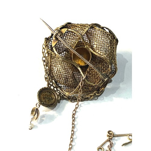 121 - 18ct gold woven brooch set with seed pearls weight 8.5g measures approx 5.3cm drop 3.1cm wide has  s... 