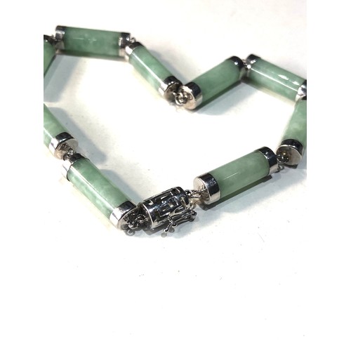 111 - 14ct  white gold jade link bracelet