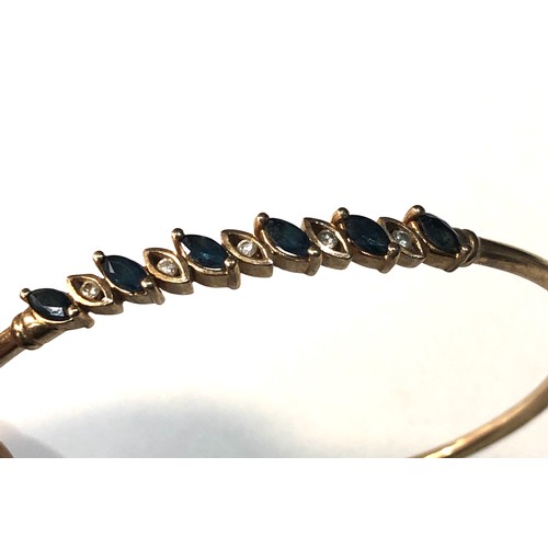 216 - 9ct gold sapphire & diamond bangle weight 6.7g