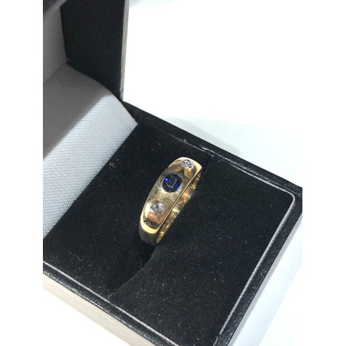 275 - 18ct gold diamond and sapphire gypsy ring weight 4g