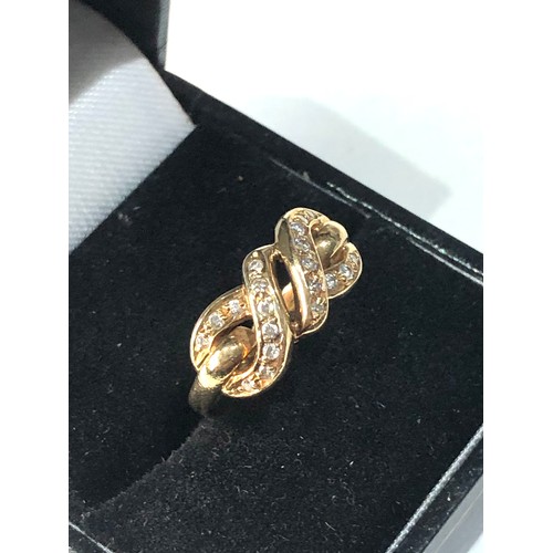 115 - 18ct gold diamond Infinity ring 4.2g