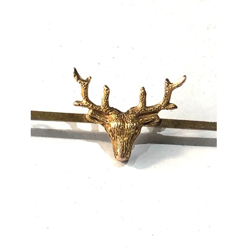 208 - 9ct gold stag pin