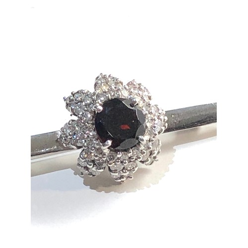 163 - 18ct white gold diamond and stone set  brooch weight 8.13g