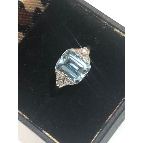 40 - Fine diamond and Aquamarine ring large central aqua is 2.40 ct with diamonds around set in platinum