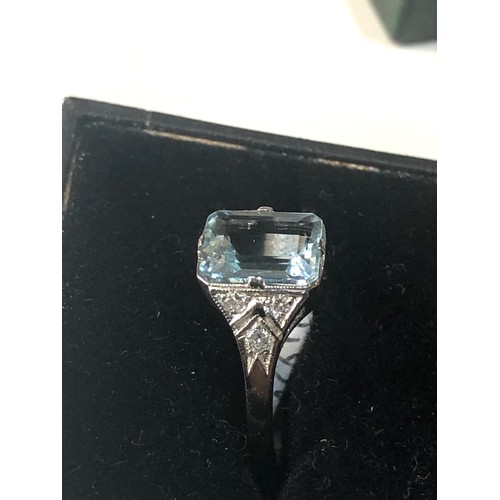 40 - Fine diamond and Aquamarine ring large central aqua is 2.40 ct with diamonds around set in platinum