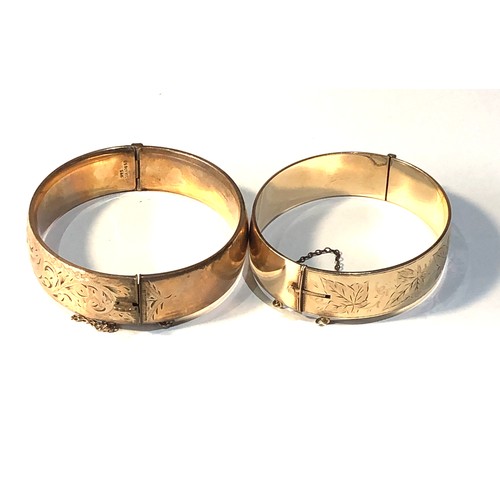 325 - 2 vintage 9ct gold core bangles weight 76g both in good condition