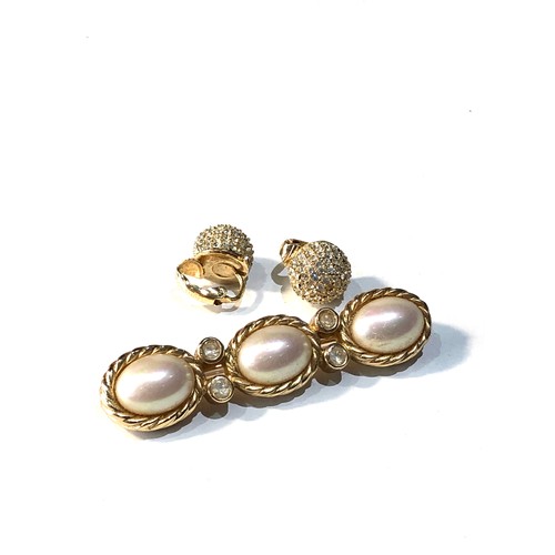 285 - Vintage Christian Dior brooch and earrings both in good condition