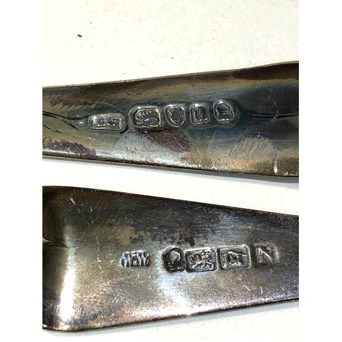 17 - 2 large Georgian silver serving spoons measure approx 23cm london silver hallmarks total weight 106g