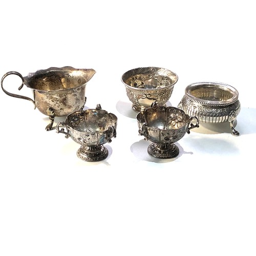 5 - Selection of silver items includes silver salts small cream jug etc