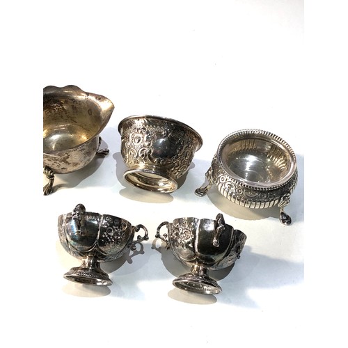 5 - Selection of silver items includes silver salts small cream jug etc