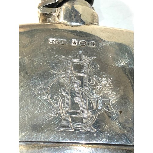 53 - Silver hip flask Sheffield silver hallmarks engraved front measures approx 9.6cm by 6cm