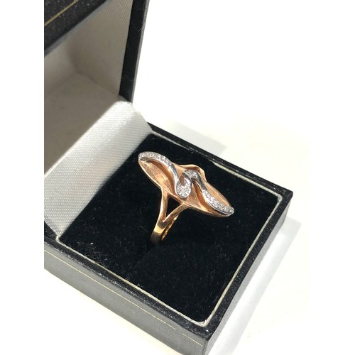 221 - Modernist design 9ct gold diamond ring weight 5.8g in good condition