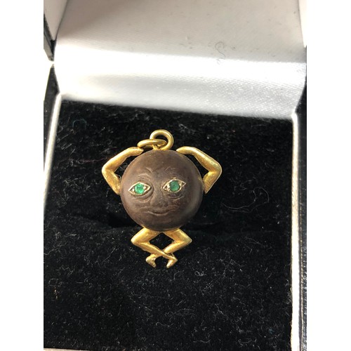 228 - Antique 18ct gold mounted fumsup charm has emerald set eyes measures approx 2.1cm drop, this piece i... 