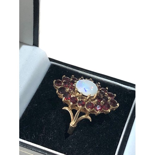 206 - 9ct gold opal & garnet ring weight 5.8g