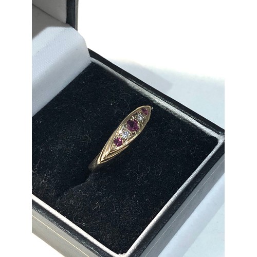 189 - 9ct gold diamond & ruby dress ring