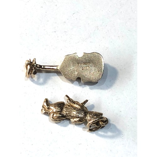 199 - 2  Vintage 9ct gold charms weigt 4.3g