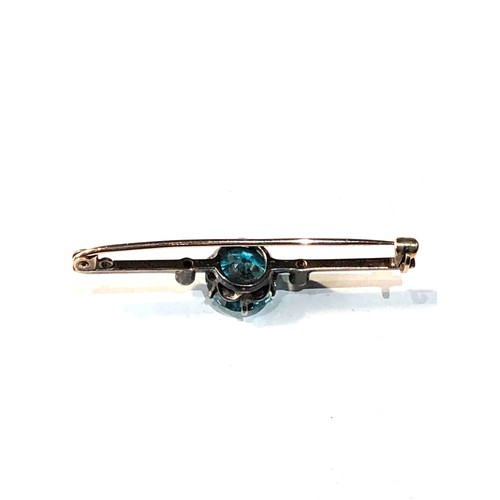 200 - Antique gold diamond and gem stone brooch measures approx 4.4cm centre gem measures approx 11mm dia ... 