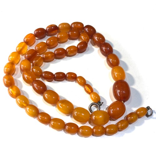 172 - Antique egg yolk amber bead necklace weight 32g