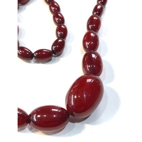 75 - Antique cherry amber bakelite bead necklace weight 26g  good internal streaking