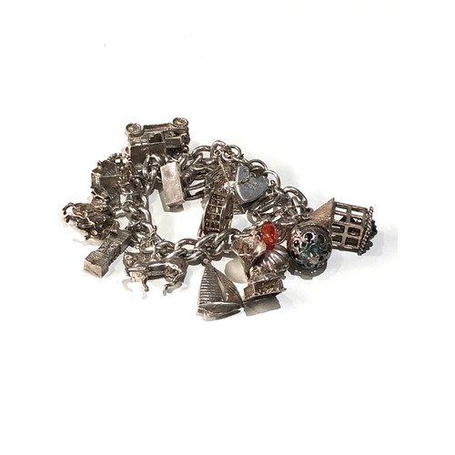 245 - Vintage silver charm bracelet weight 104g