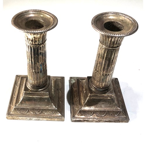 22 - Pair Antique silver corinthian column candlesticks measure approx height 14cm London silver hallmark... 