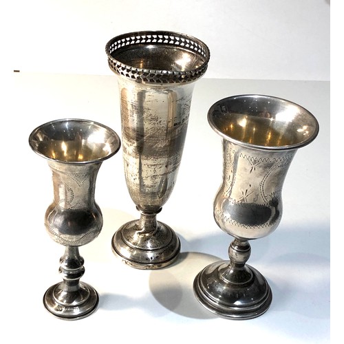 59 - 3 silver items includes 2 goblets and a vase filled base goblets weigh 110g