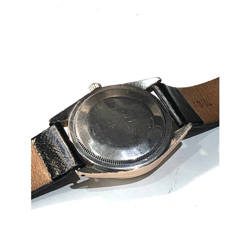 84 - Gents Rolex oyster perpetual wristwatch in working order but no warranty is given measures approx 33... 