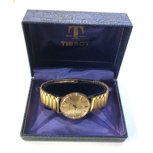 88 - Boxed 9ct gold gents Tissot seastar seven wristwatch in working order and good condition but no warr... 