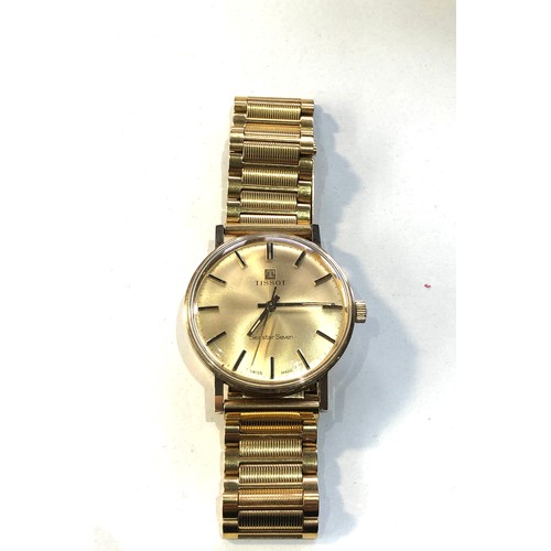 88 - Boxed 9ct gold gents Tissot seastar seven wristwatch in working order and good condition but no warr... 