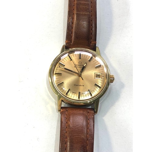 90 - Vintage Omega Geneve automatic date cal 585 gents wrist watch in working order but no warranty is gi... 