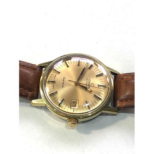 90 - Vintage Omega Geneve automatic date cal 585 gents wrist watch in working order but no warranty is gi... 