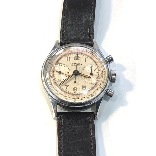 93 - Vintage gents Leonidas chronograph wristwatch measures approx 35mm dia winds and ticks centre second... 