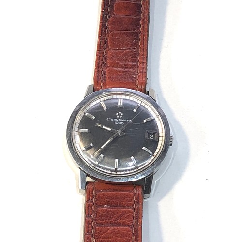 65 - Vintage Eterna-matic 1000 gents wristwatch in working order and good used condition no warranty is g... 