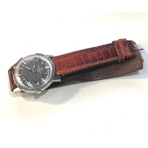 65 - Vintage Eterna-matic 1000 gents wristwatch in working order and good used condition no warranty is g... 