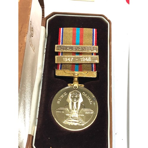 439 - 2 boxed medals inc suiez campaign and national service medals