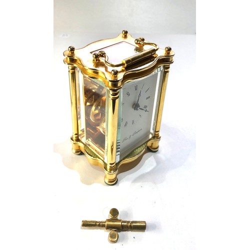 476 - Fine quality brass carriage clock by Fox & Simpson measures approx 12cm tall not including handle wo... 