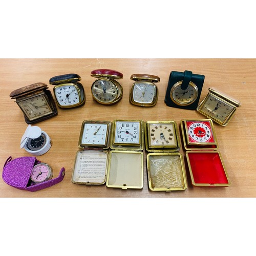 133 - Selection of 12 vintage travel clocks, all untested