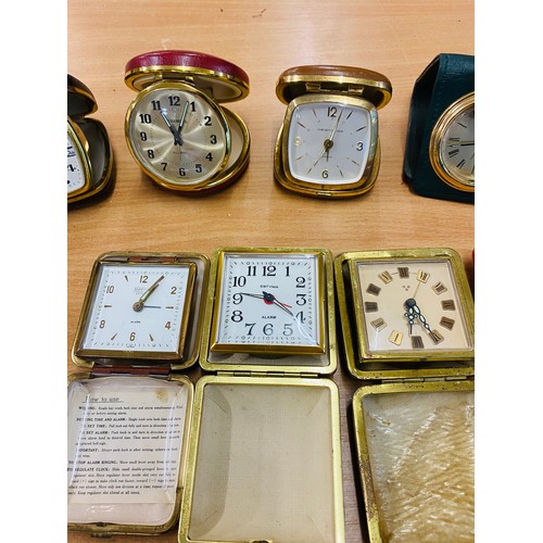 133 - Selection of 12 vintage travel clocks, all untested