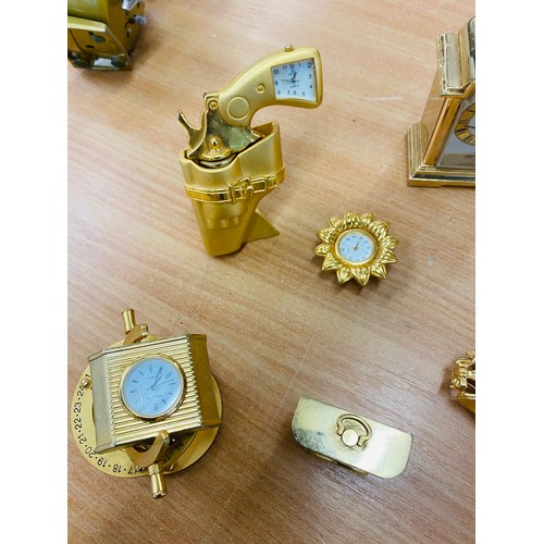 131 - Selection of 8 miniature gold tone novelty collectable mantle clocks, all untested