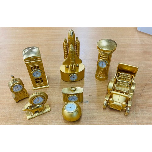 132 - Selection of 8 miniature gold tone novelty collectable mantle clocks, all untested