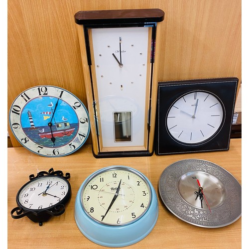 82 - 6 New wall clocks, all battery operated, all untested