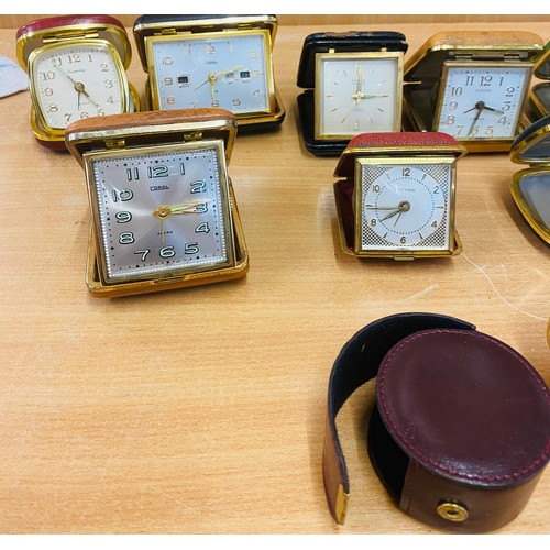 135 - Selection of 12 vintage travel clocks, all untested