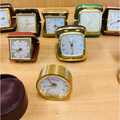 135 - Selection of 12 vintage travel clocks, all untested