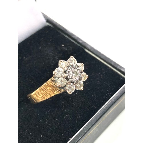 143 - 18ct gold diamond cluster ring weight 4.8g