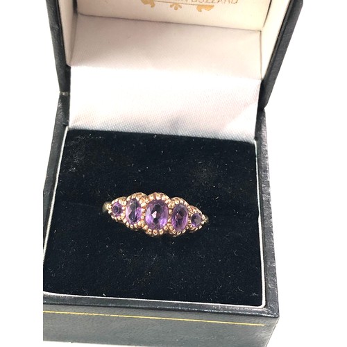 114 - 9ct gold amethyst graduated 5 stone ring weight 2.5g